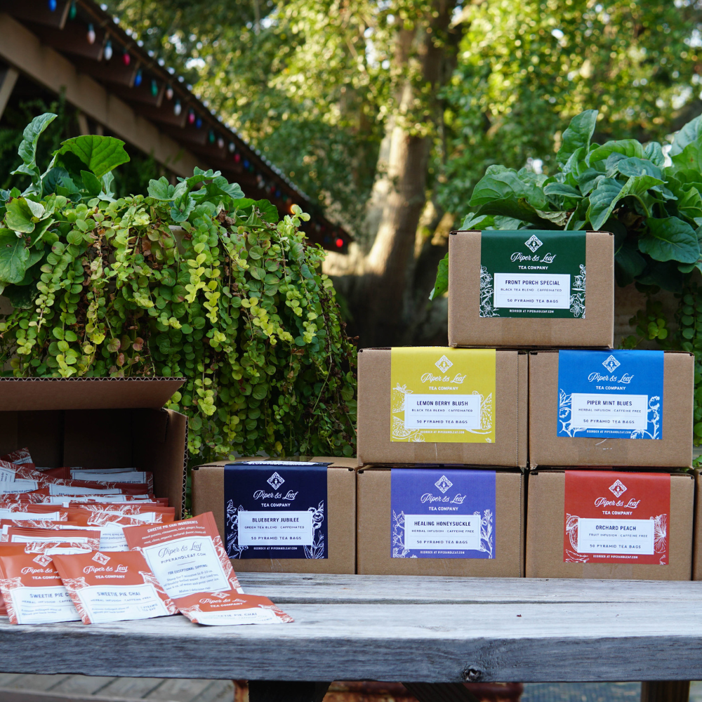 A table with several boxes of teas on it.