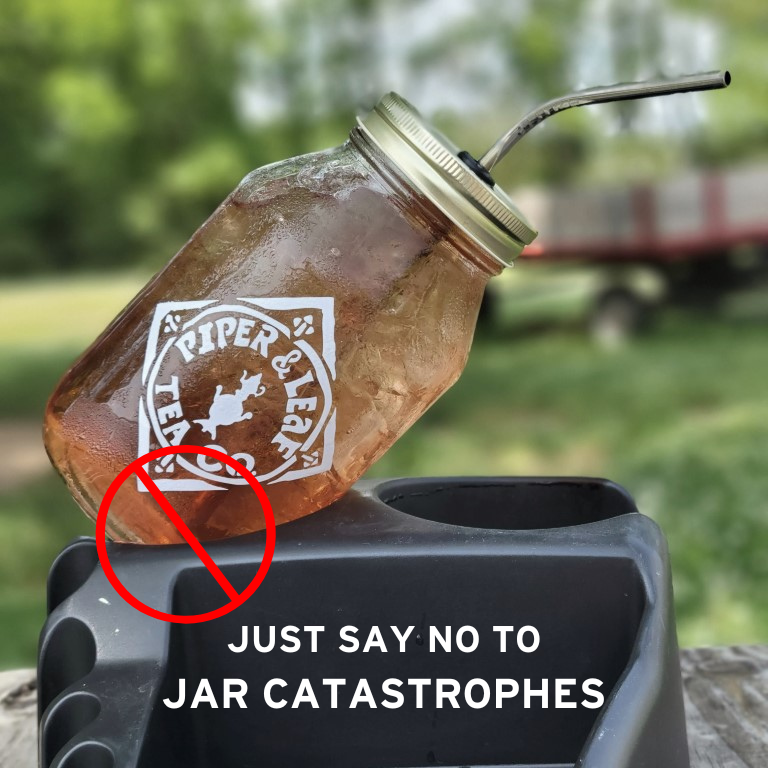 Avoid jar catastrophes with the Piper and Leaf Tea Co. Mason Jar Cup Holder Adapter - Keep Your Jar in the Car, perfect for keeping your drinking jar secure in cup holders.