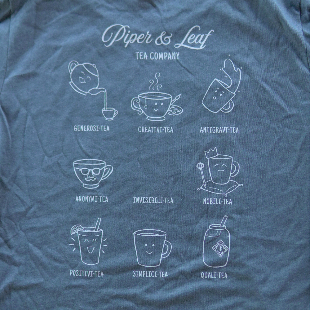 A soft short sleeve shirt with a variety of screen printed Piper & Leaf Tea Co. "Personali-Tea" designs on it.