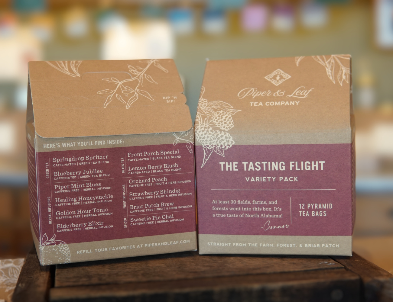 Two individually wrapped tea bag sachets from Piper & Leaf Tea Co., featuring a "Tea Tasting Flight" variety pack with different flavors listed.