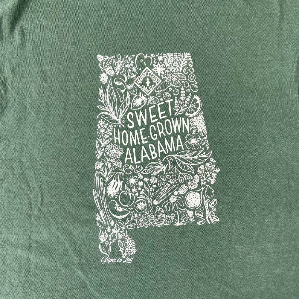 back design of "home grown" tee