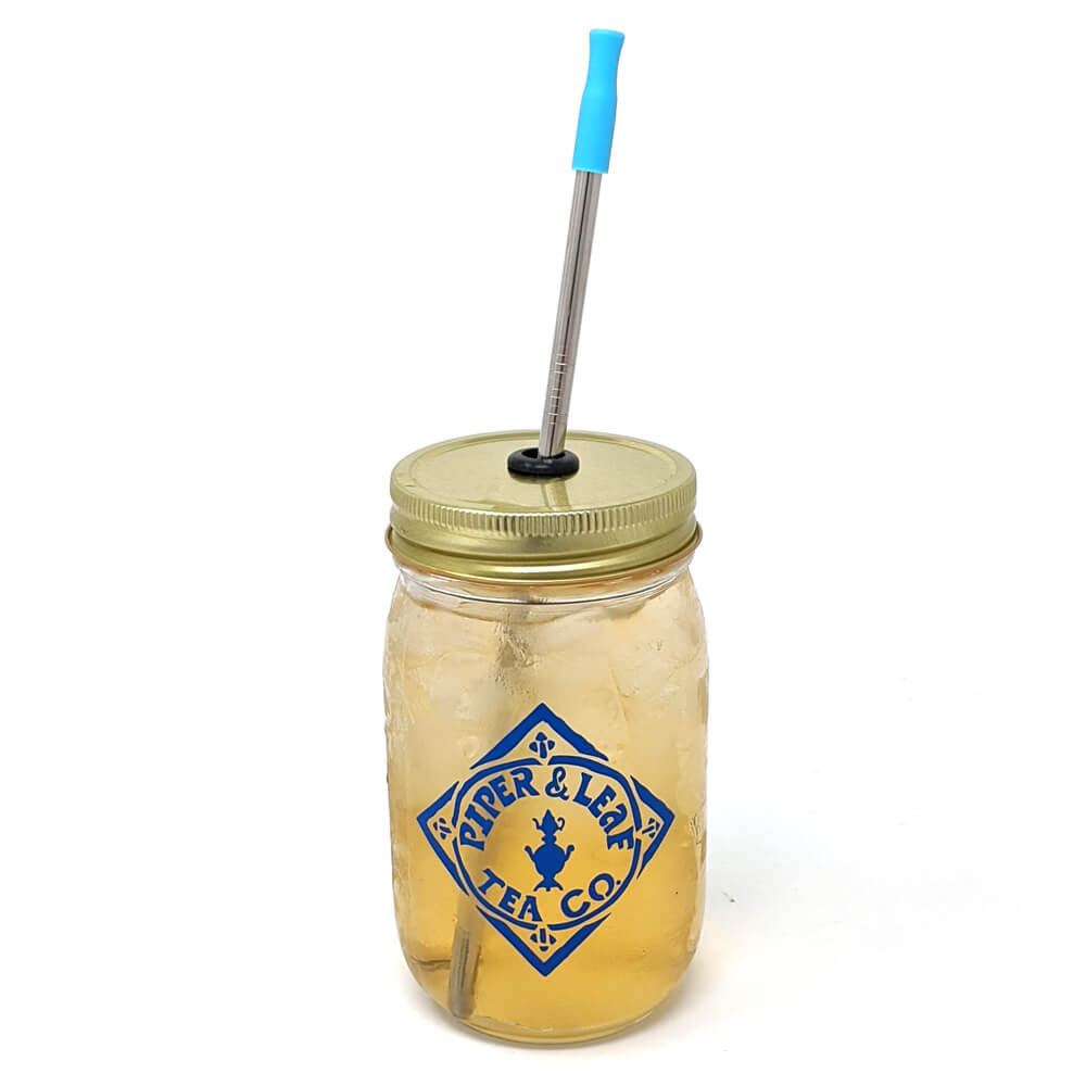 A mason jar with Piper & Leaf Tea Co.'s Stainless Steel Straws - 12 Pack (8.5").