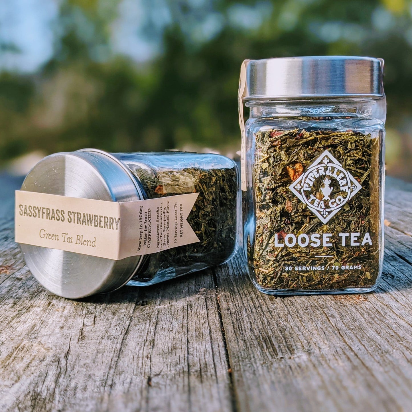 Two glass jars of loose leaf (Sassyfras Strawberry)