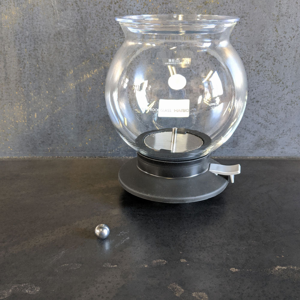 Dripper tea strainer shown with replacement part steel ball