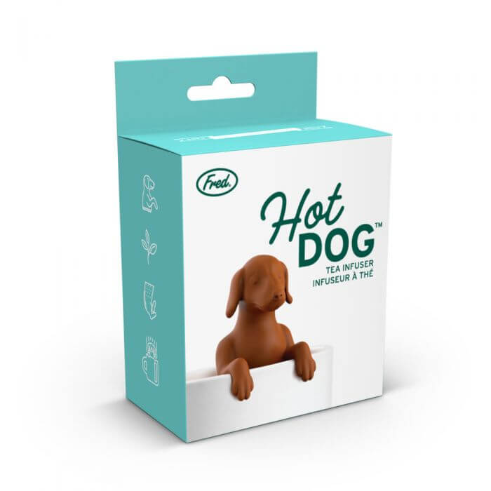 The box for the dog shaped Fred-brand tea strainer in a glass mug: the Hot Dog