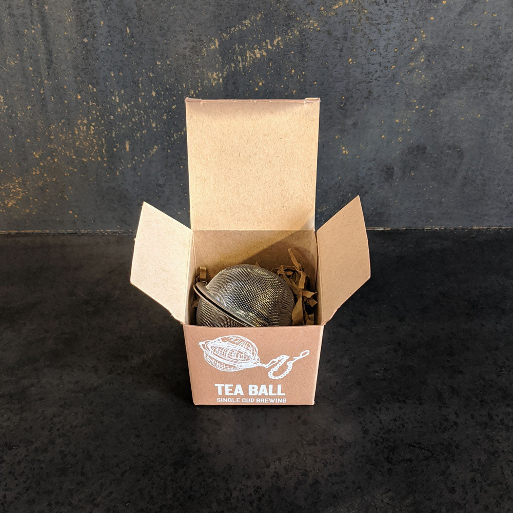 Mesh tea ball strainer in the box