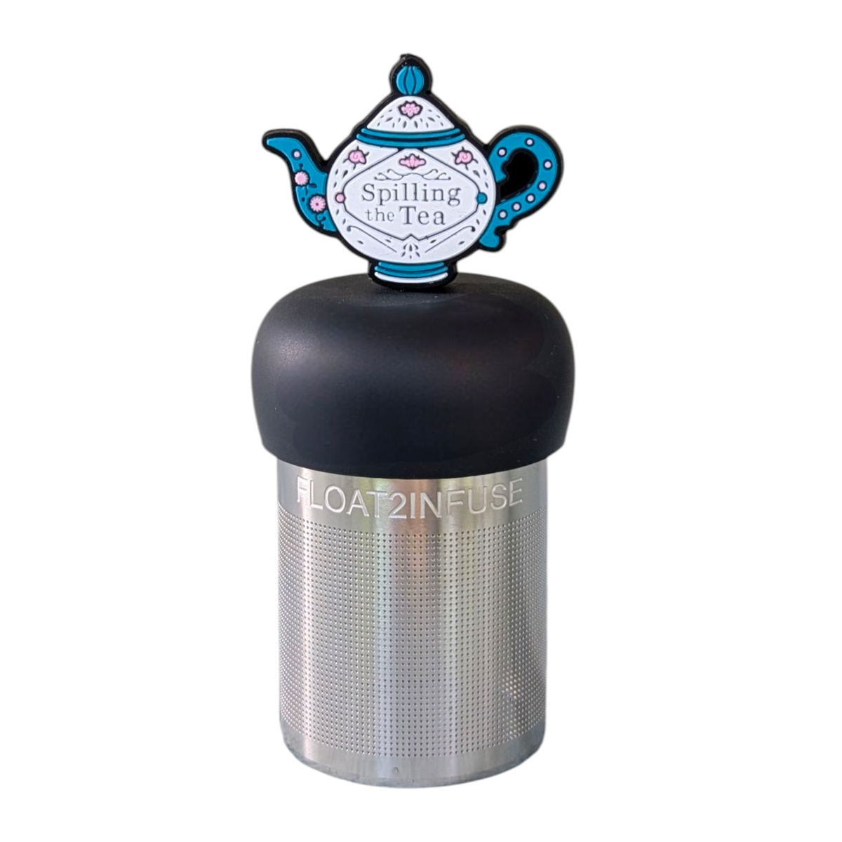 Introducing the Float2infuse Tea Infuser—the stylish Spill the Tea - Floating Tea Infuser. Crafted with a durable stainless steel mesh, this loose leaf tea accessory features a sleek black lid topped with a charming teapot-shaped decoration reading “Spilling the Tea.” Ideal for savoring your favorite blends, it also showcases “FLOAT2INFUSE” printed on its side for a signature touch.