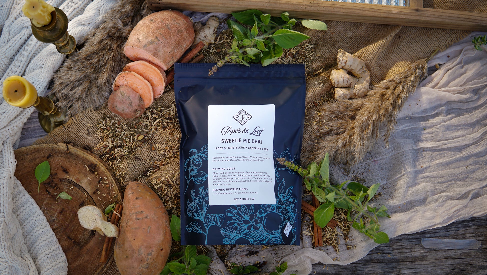 A Pound Bag of Piper & Leaf Tea Co. Sweetie Pie Chai, a caffeine-free loose leaf blend with candied sweet potato, ginger, and herbs, sits on a rustic surface—perfect for serving up to 190 cups.