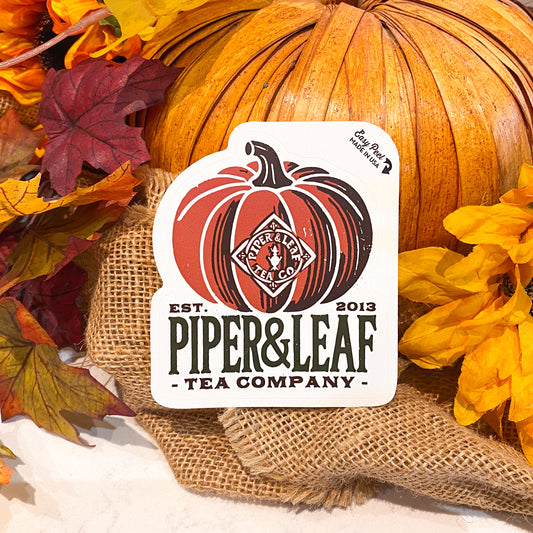 The Piper Pumpkin Sticker by Piper & Leaf Tea Co. features a rustic pumpkin design with autumn leaves, burlap, and a large pumpkin in the background.