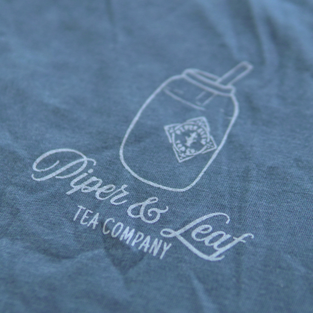 A soft blue short sleeve t-shirt with a mason jar screen printed on it by Piper & Leaf Tea Co.'s "The Personali-Tea" Short Sleeve Tee Shirt.