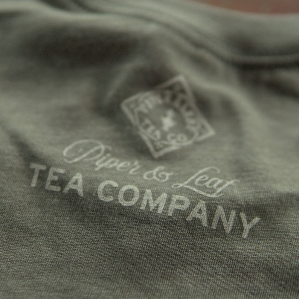 A close up of a Sweet Tea Country t-shirt pullover from Piper & Leaf Tea Co.