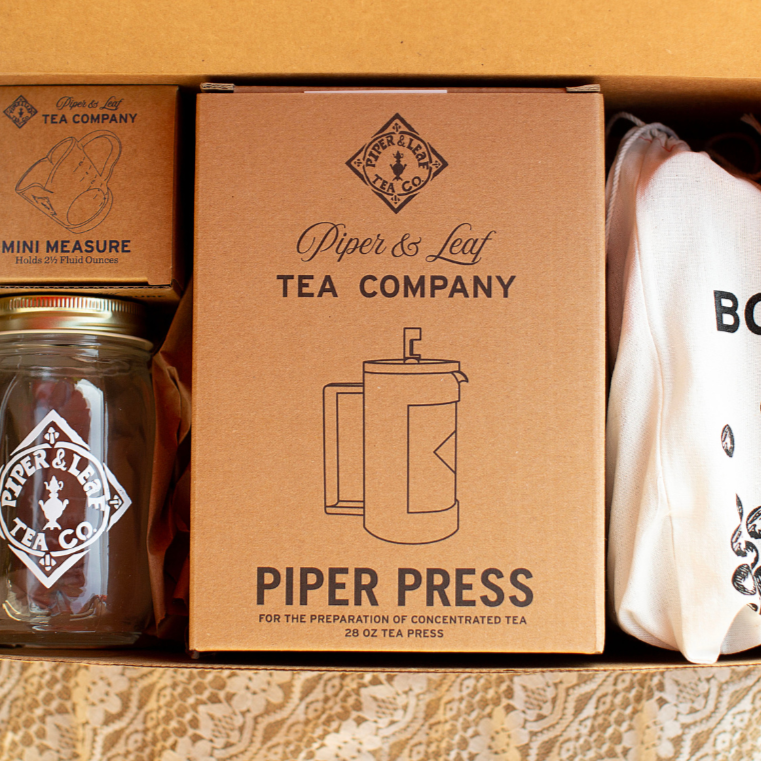 A Piper & Leaf Tea Co. Boba Tea Kit containing a tea box and a mug.