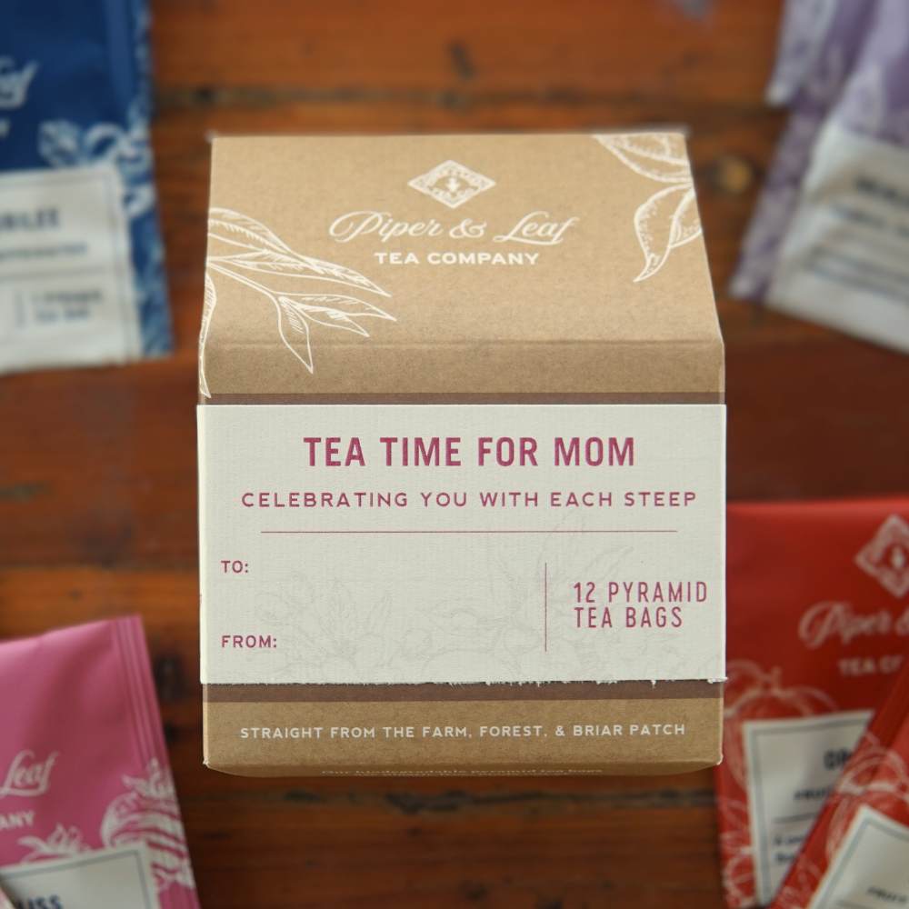 A box of "Tea Time For Mom" from Piper & Leaf Tea Co., featuring 12 pyramid tea bags and labeled spaces for "to" and "from.