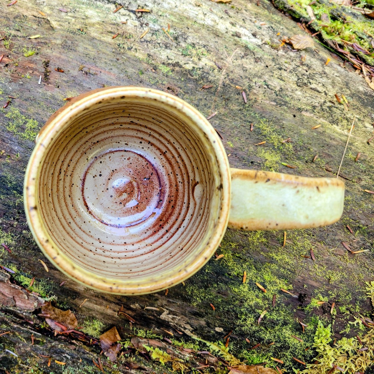Inside look at the handmade pottery mug "HOT-TEA"