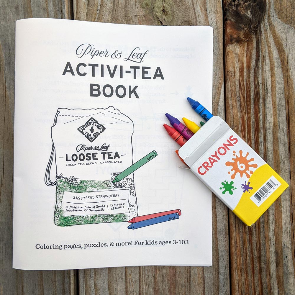 A box of 6 crayons and a coloring book titled "Piper & Leaf Activi-tea Book"
