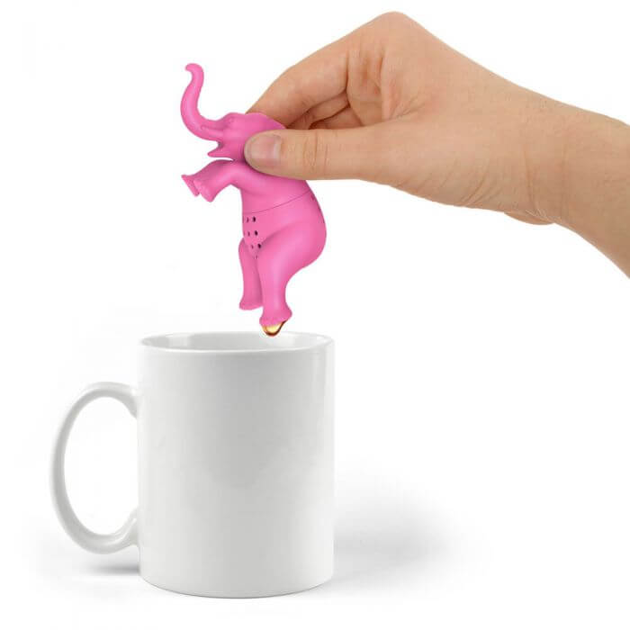 A elephant shaped Fred-brand tea strainer over a mug: Big Brew