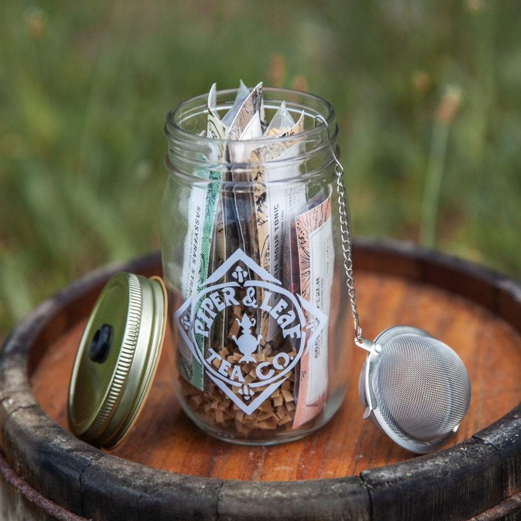 A Piper & Leaf Tea Co. Teaser Pint Jar Gift Set filled with loose leaf tea blends and spices.