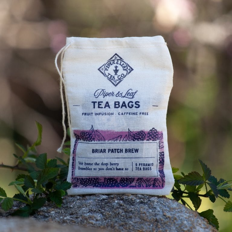 A Briar Patch Brew 9ct Tea Bag in Muslin from Piper & Leaf Tea Co. peacefully resting on top of a rock.