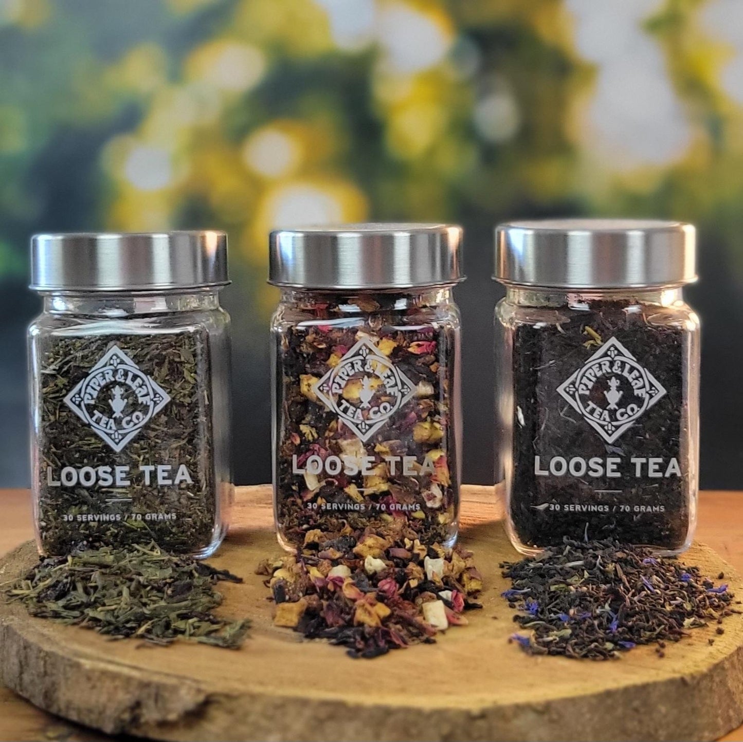 Four Jars Of Loose Tea Leaves On A Brick Wall Stock Photo, Picture and  Royalty Free Image. Image 26057970.