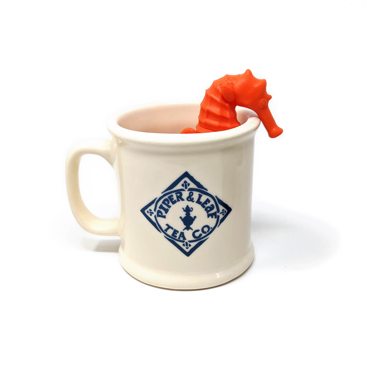 A "teahorse" steeping in a Piper mug. This seahorse shaped FRED brand strainer is great for brewing tea