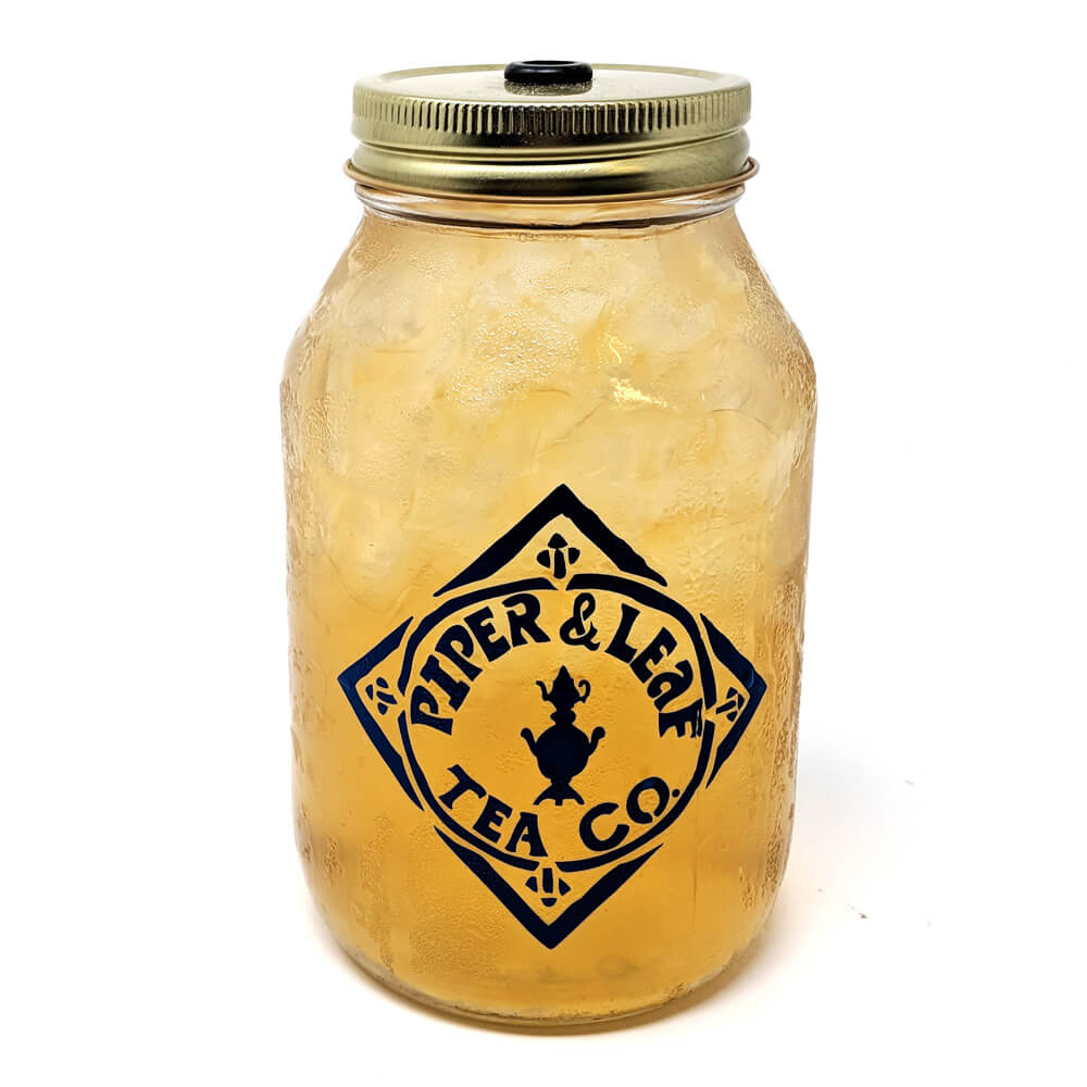 A quart mason jar filled with an iced Sweetie Pie Chai tea